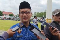Caption foto: Bupati Tasikmalaya Cecep Nurul Yakin usai memimpin upacara peringatan HUT ke-54 KORPRI di Lapangan Setda, Komplek Pemkab Tasikmalaya, Senin (1/12/2025).